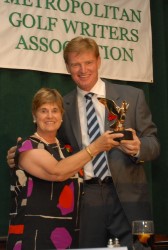 Former MGWA President Patricia Norton presents the 2011 Winnie Palmer Award to Ernie Els