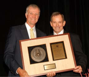 MGWA member Al Small presents the 2009 Distinguished Service Award to Gene Westmoreland